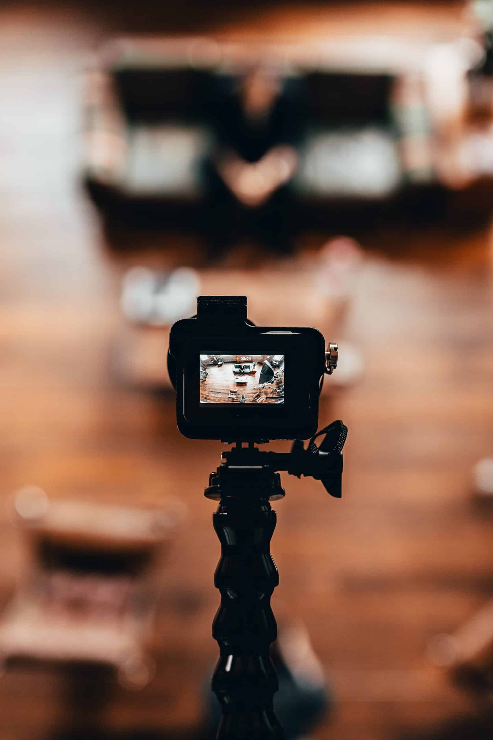 camera on a stand with a blurry background