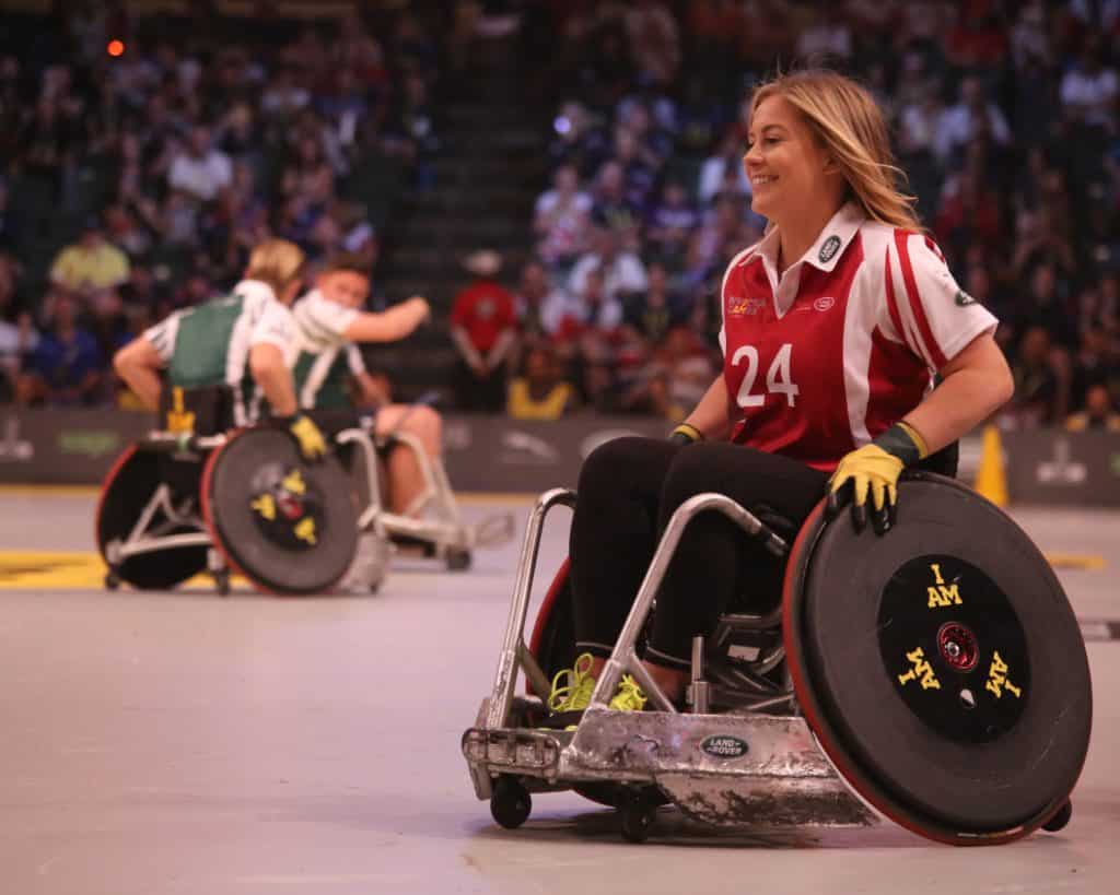 An athlete playing wheelchair basketball.