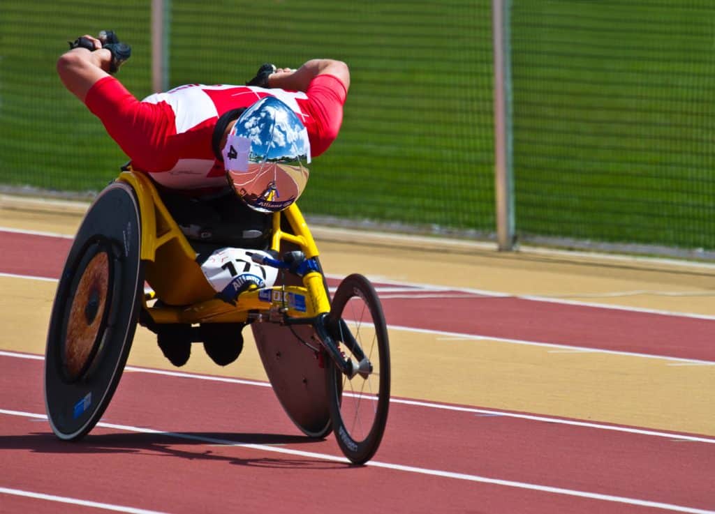 A man in a tricycle joining the race.