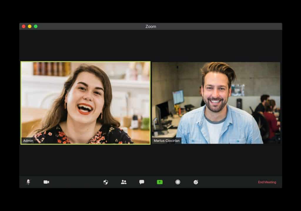 A screen capture of zoom meeting of a man and a woman 