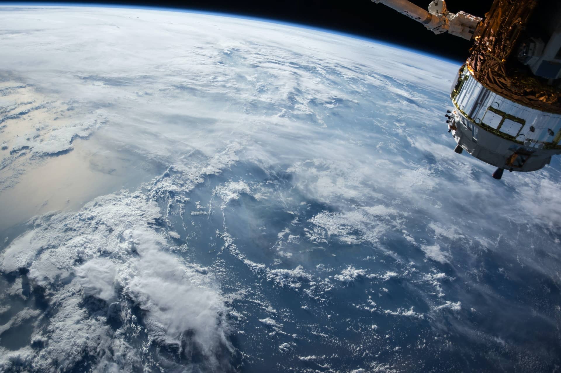 Image of earth and a satellite from space