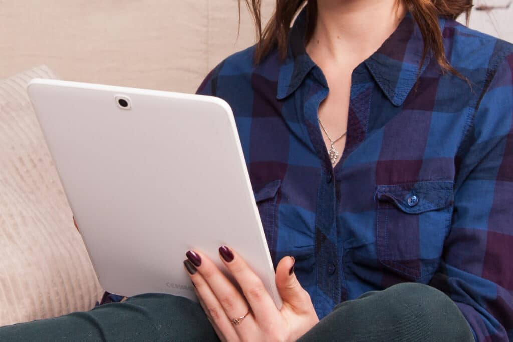 person holding a tablet