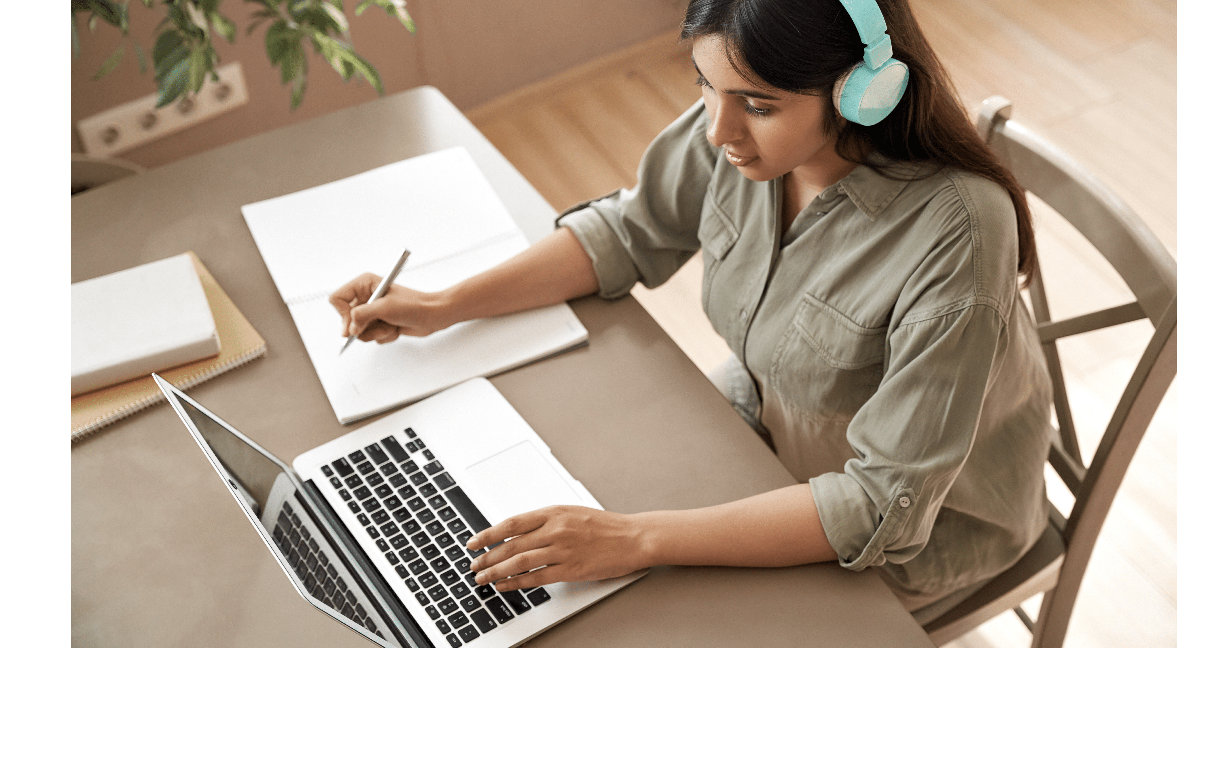 woman wearing headphones working on a computer