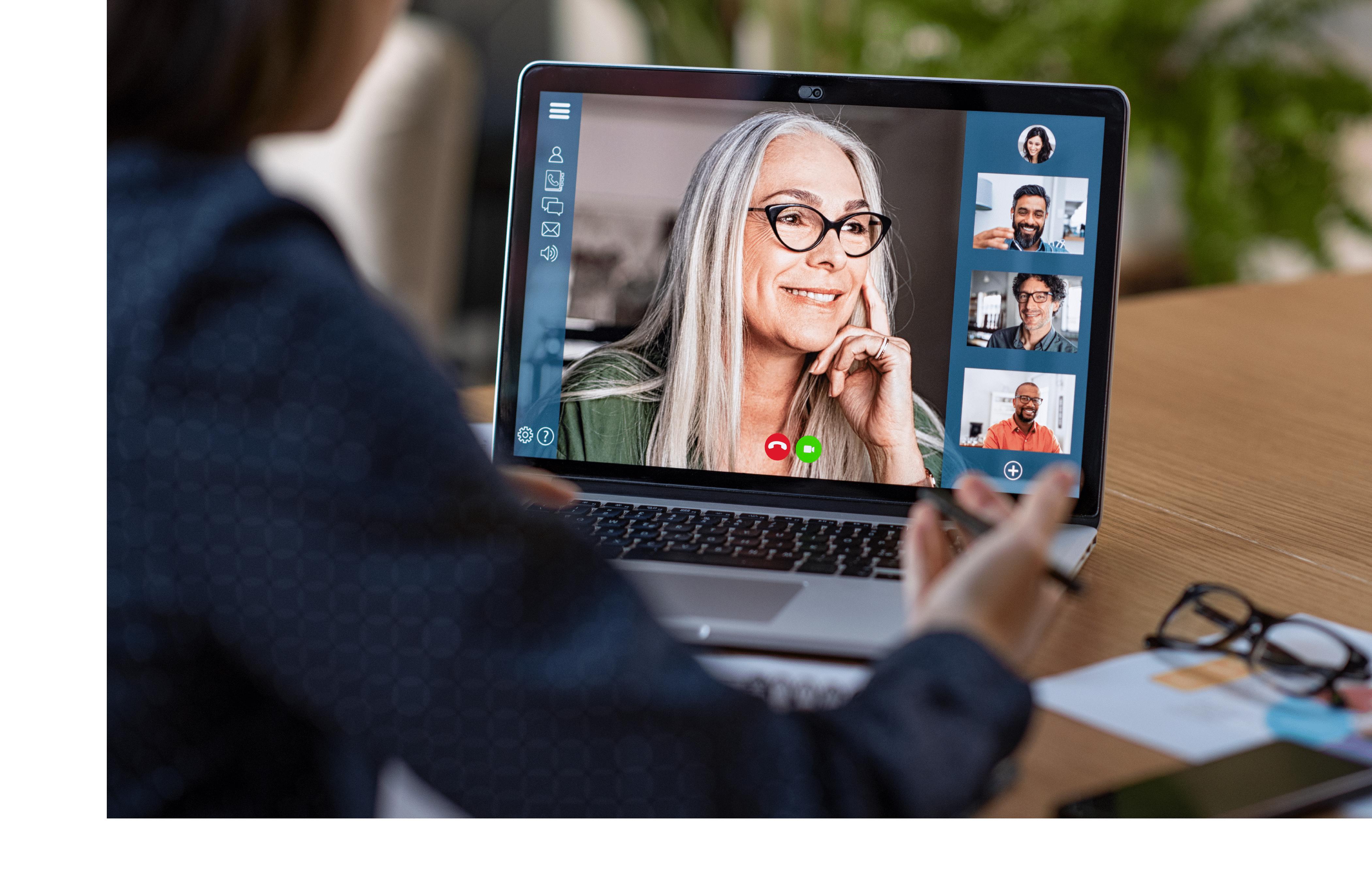 person speaking to four others on a video call