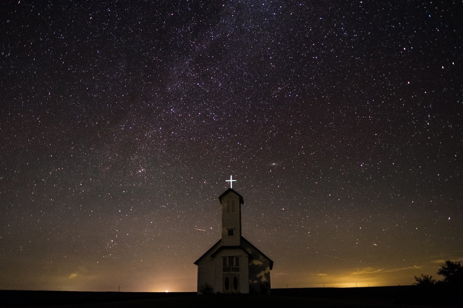 church under a sea of stars