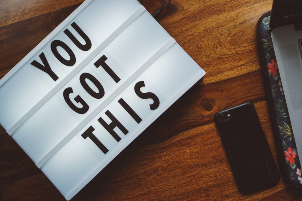 a sign on a desk that says "you got this"