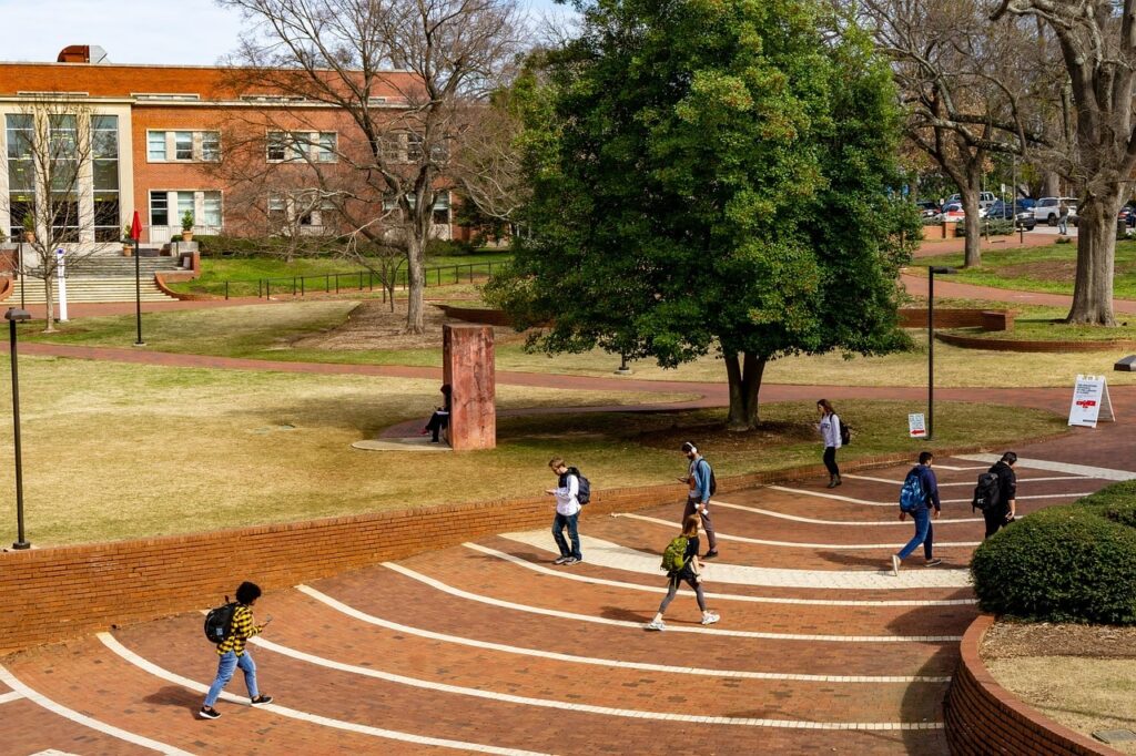students walking outside on a campus