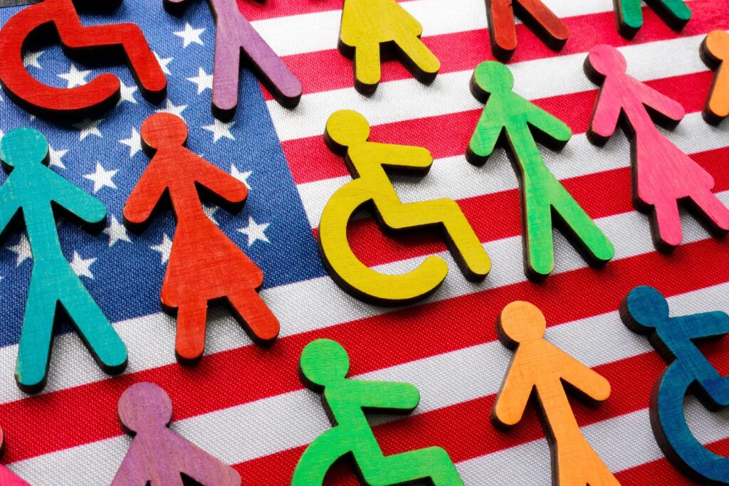 An American flag with icons of people