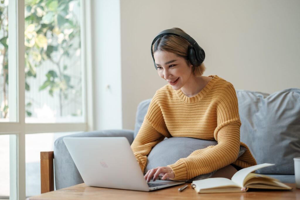 young woman on a computer studying