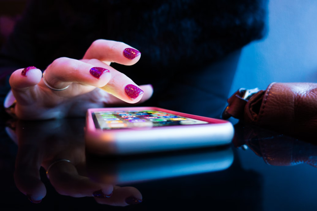 woman using apps on a phone