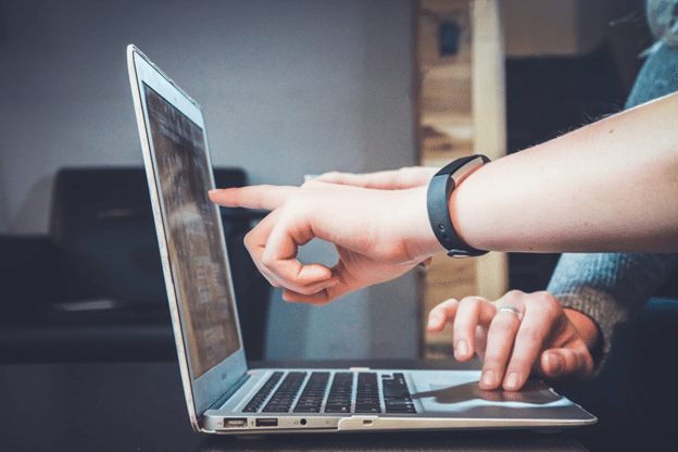 two people looking at a computer screen