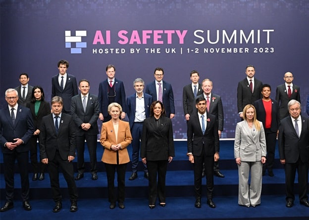 World leaders posed in front of an AI Safety Summit backdrop