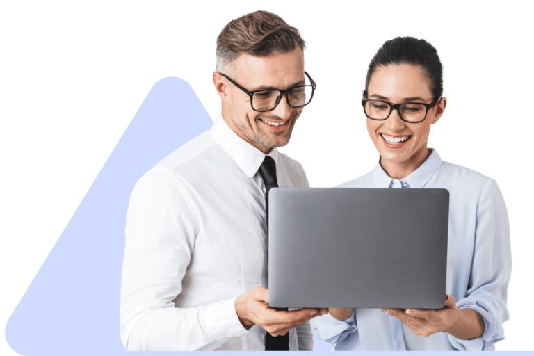 A professionally dressed man and woman look at an open laptop