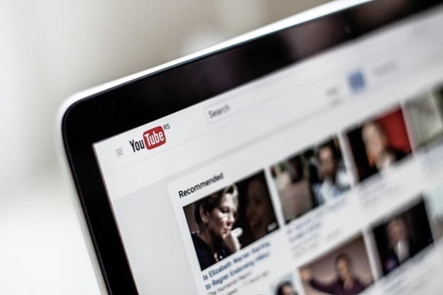 Close up of YouTube home screen on computer screen.