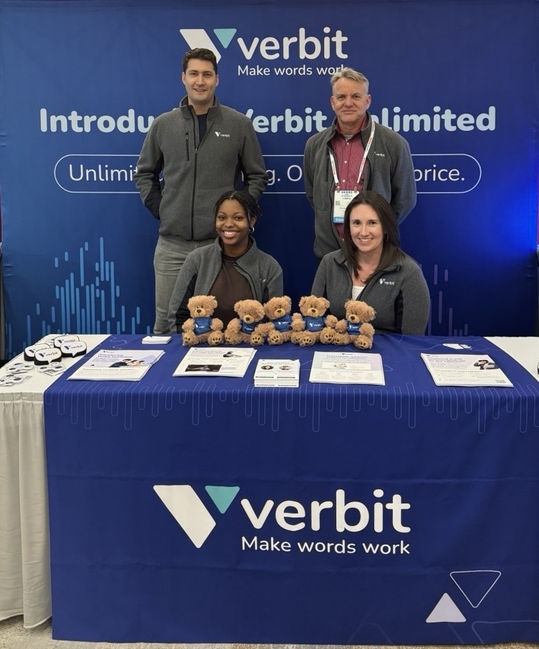 Verbit's team - two men and two women - in the Verbit booth.