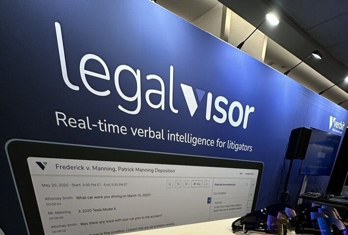Verbit's booth at Legalweek 2025. A blue wall with the words "Legal Visor" in white