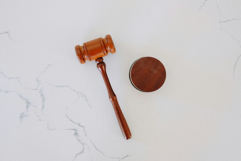 A wooden gavel denoting legal