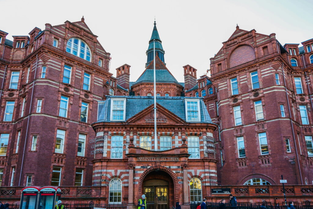 A large red brick building on University College London's campus.