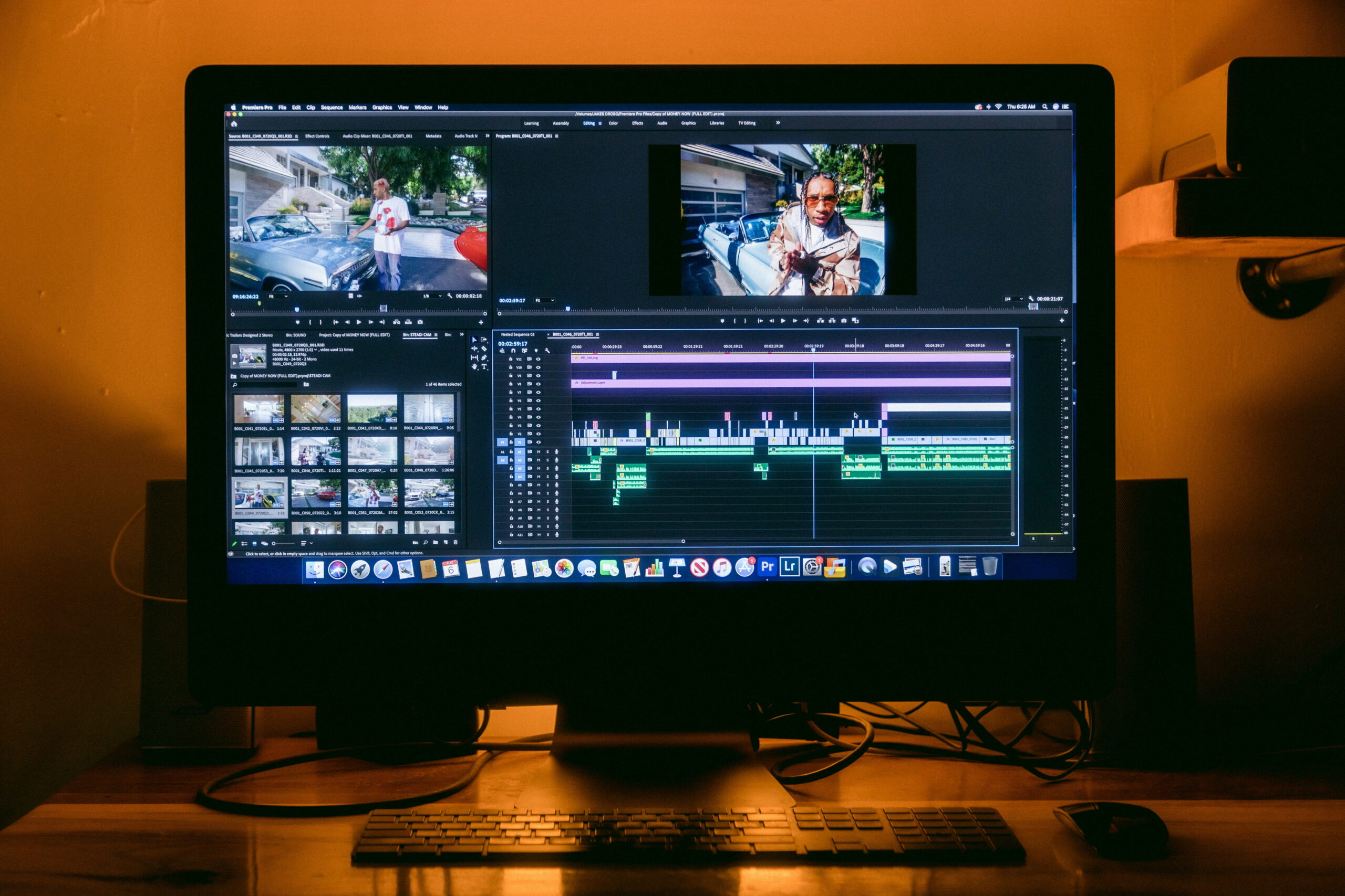 A computer monitor displaying a video editing timeline interface (Adobe Premiere Pro) used for cutting and assembling footage.